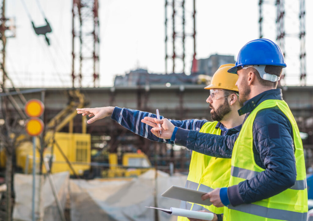 Project managers discussing construction plans